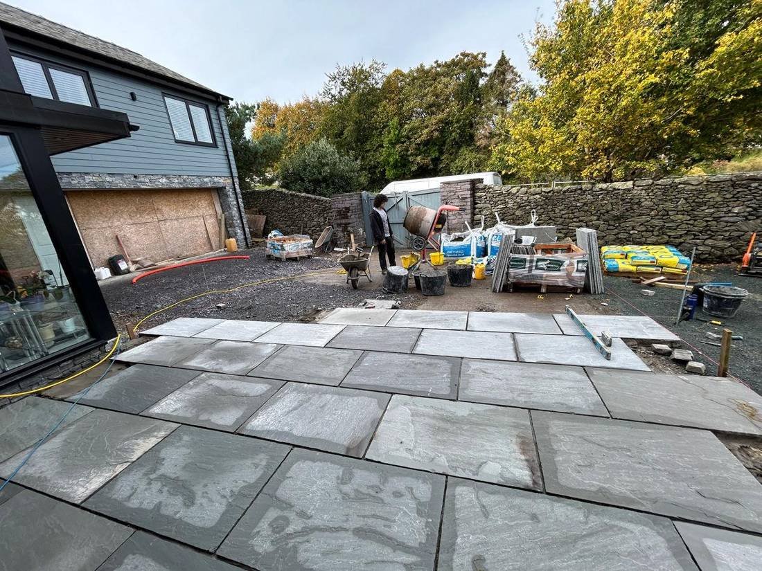 Large porcelain patio being laid